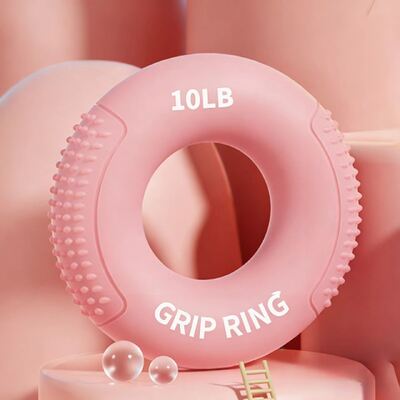 Phụ nữ trong văn phòng Silikon Grip Trainer để tăng cường phát triển cơ bắp cánh tay trước
